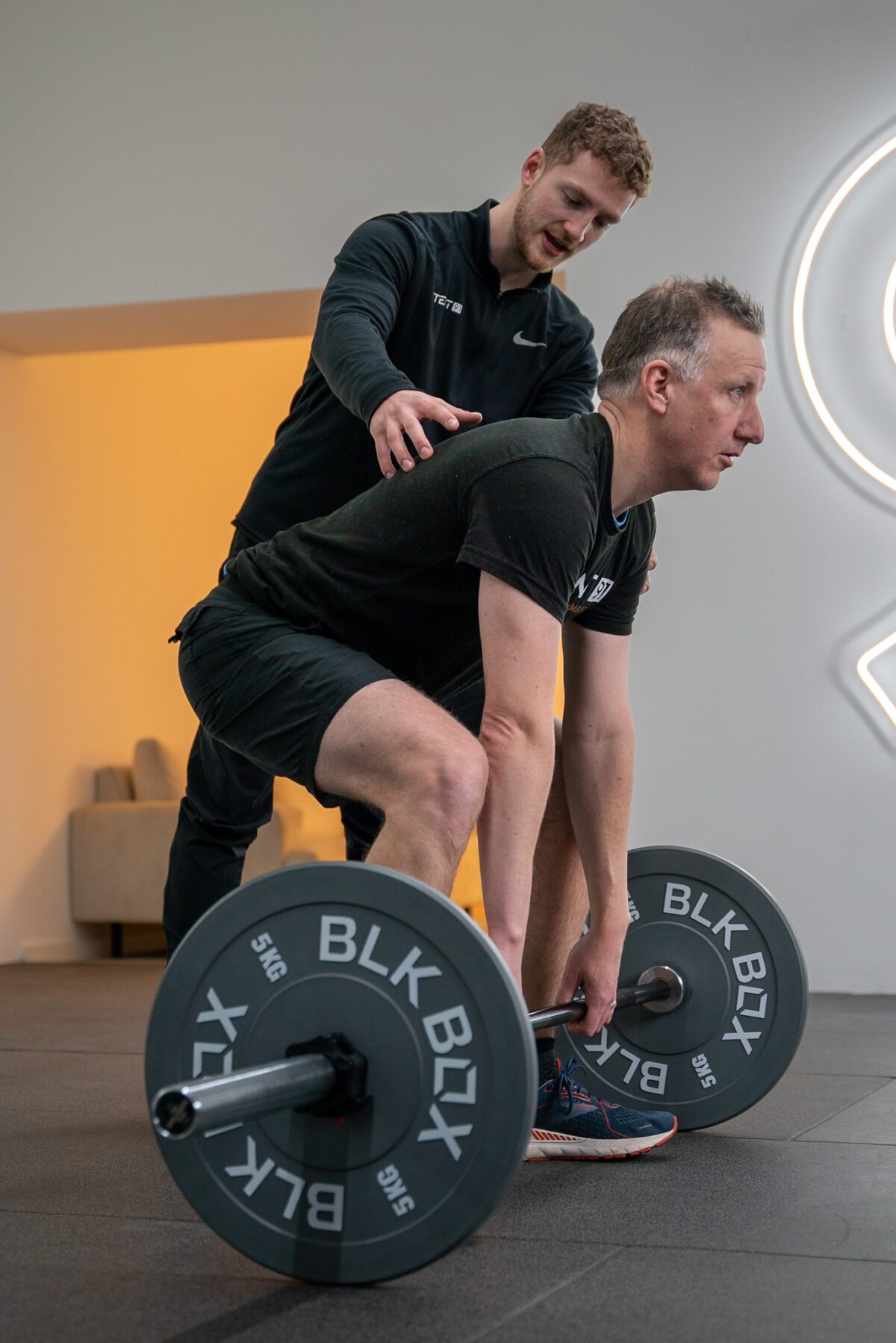 personal trainer in brighton coaching a deadlift