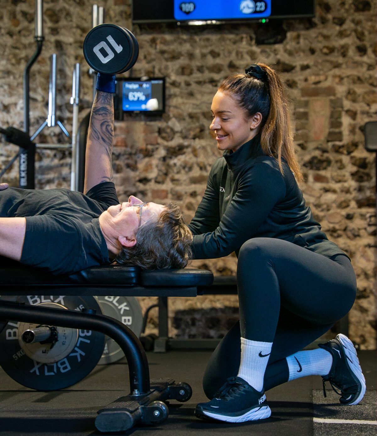 personal trainer in brighton coaching chest press